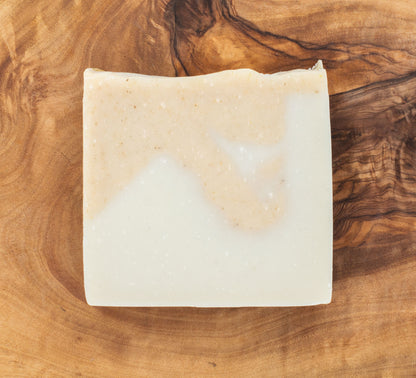 Bar of soap on a wooden surface