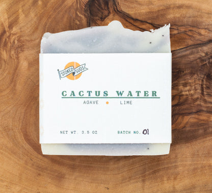 Bar of soap labeled 'Cactus Water' on a wooden surface